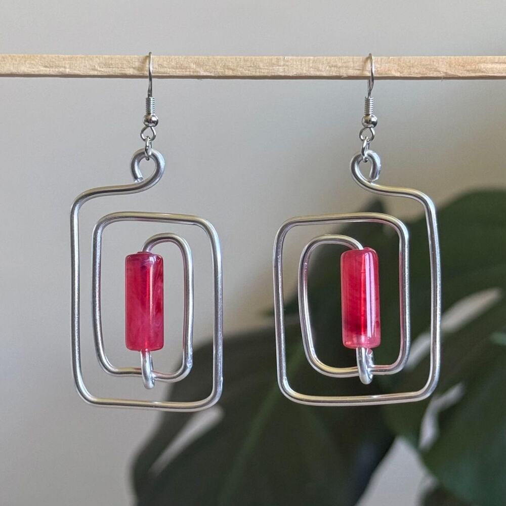 handmade silver wire spiral earrings with hot pink tube beads